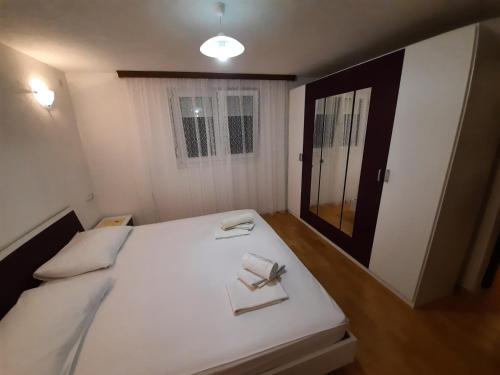 Ένα ή περισσότερα κρεβάτια σε δωμάτιο στο Apartment Zlatko