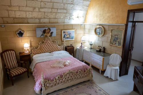 En eller flere senge i et værelse på Torre Pinta