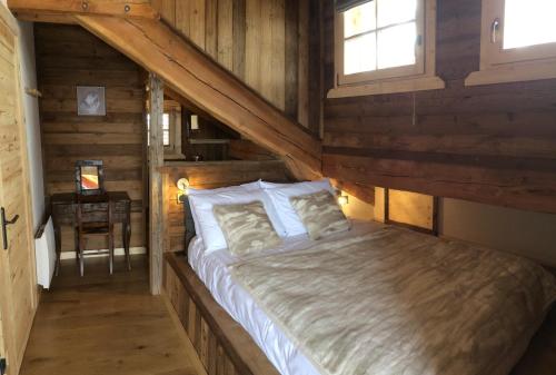 Ένα ή περισσότερα κρεβάτια σε δωμάτιο στο Chalet Le Montana