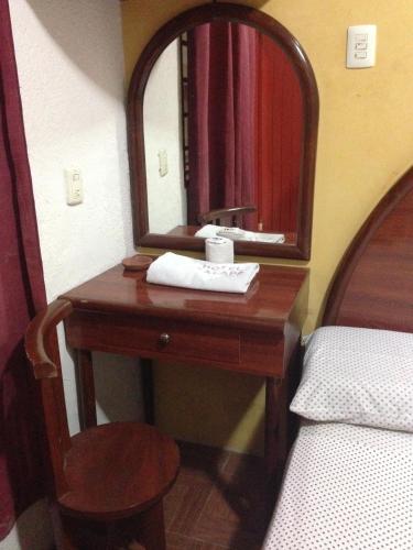 Hotel Xalapa 객실 침대