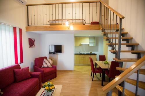 Kuhinja ili čajna kuhinja u objektu Apartments and Rooms Millennium