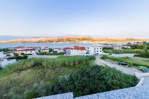 an aerial view of a town next to a body of water at MB Bed&Breakfast in Pag