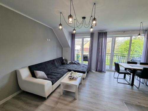 Posedenie v ubytovaní Domek pod świerkami - "Apartamenty świerkowe"