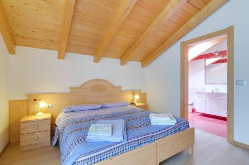 Ένα ή περισσότερα κρεβάτια σε δωμάτιο στο Agritur Belsogno B&B