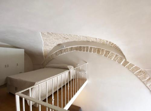 Letto o letti in una camera di Casa Flavia