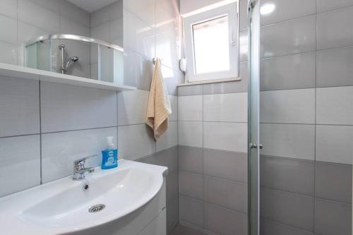 Kúpeľňa v ubytovaní Apartman Harfa 2
