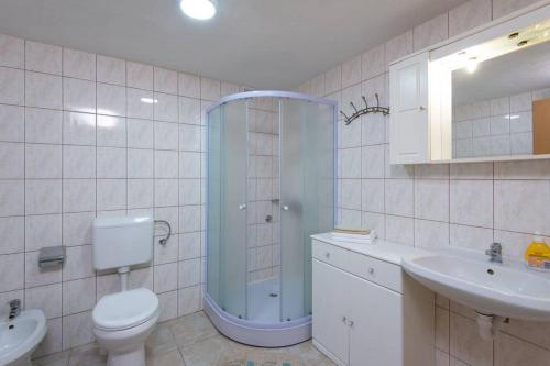 Kúpeľňa v ubytovaní Apartman Harfa 3