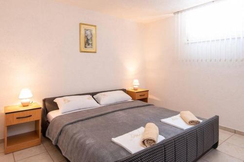 Posteľ alebo postele v izbe v ubytovaní Apartman Harfa 3