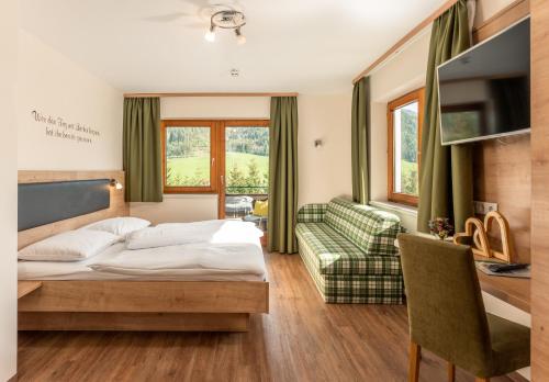Katil atau katil-katil dalam bilik di Hotel Starchlhof