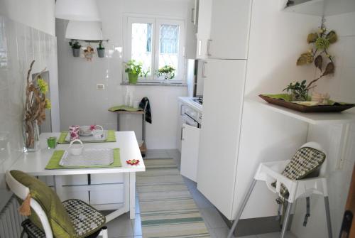 Kuchyň nebo kuchyňský kout v ubytování Elly Casa Vacanze