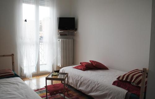 Postel nebo postele na pokoji v ubytování Elly Casa Vacanze
