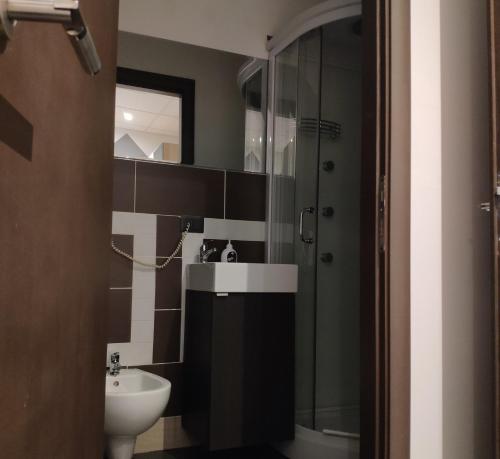 a bathroom with a sink and a toilet and a shower at B&B Adriatico in Giulianova