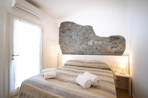A bed or beds in a room at Agriturismo Eos