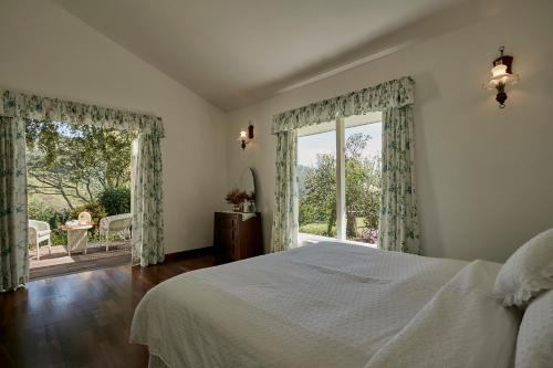 Ένα ή περισσότερα κρεβάτια σε δωμάτιο στο CLAVERTON by Ceylon Bungalows