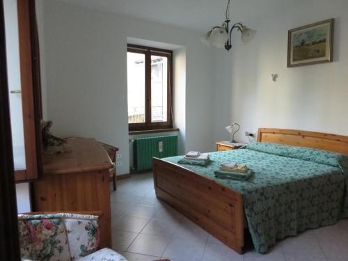 Cama ou camas em um quarto em Casa Almut & More - Lake Como Center - Varenna