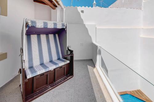 En eller flere senge i et værelse på Casa do céu