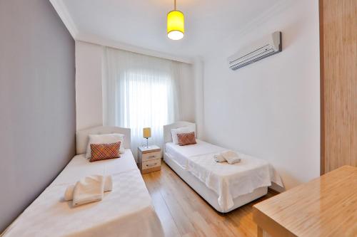 Katil atau katil-katil dalam bilik di Bossa Nova Apart Hotel