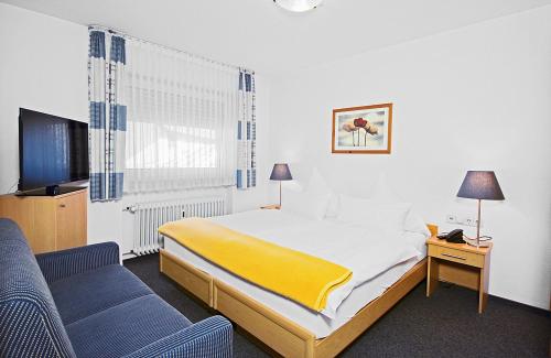 Postelja oz. postelje v sobi nastanitve Hotel Lindenkrug