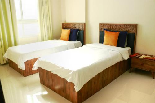 En eller flere senge i et værelse på ALmansor furnished Apartment 1