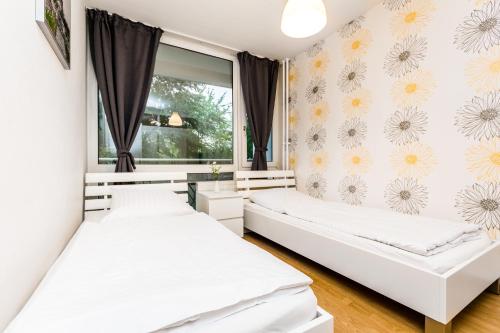 Cama o camas de una habitación en Budget Apartments Deutz