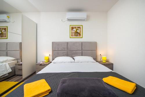 Posteľ alebo postele v izbe v ubytovaní Apartment Exclusive Nia