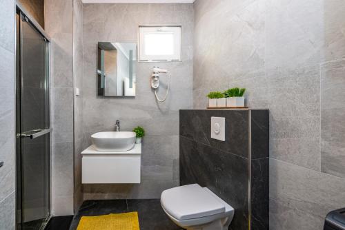 Kúpeľňa v ubytovaní Apartment Exclusive Nia