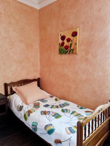 Ένα ή περισσότερα κρεβάτια σε δωμάτιο στο Chambre d'hôte Daugé