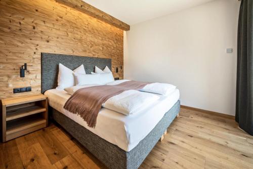 Llit o llits en una habitació de App Mulin Moidl mit Sauna