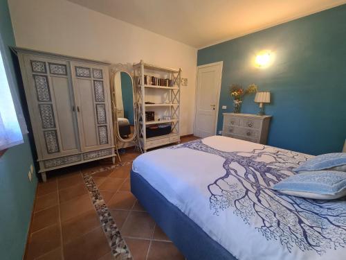Postel nebo postele na pokoji v ubytování Villa Paola San Teodoro con piscina privata