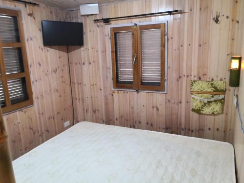 Postelja oz. postelje v sobi nastanitve Parco Vacanze Makallè