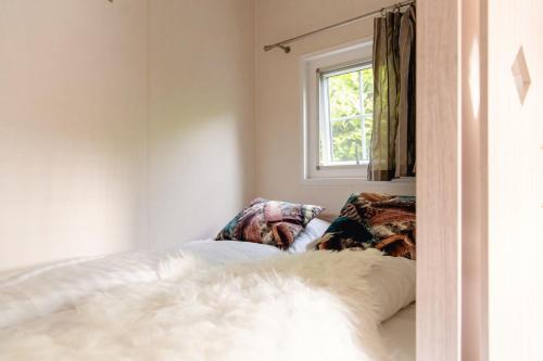 Una cama o camas en una habitación de Scandinavian lodge