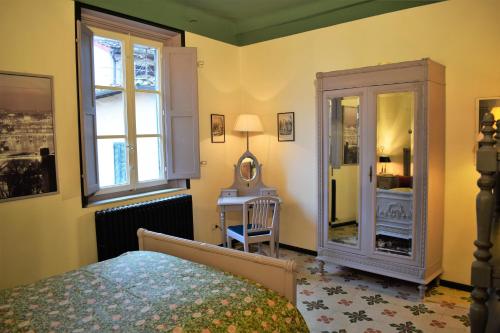 Un pat sau paturi într-o cameră la Il Carmine Charme & Terrace with AC