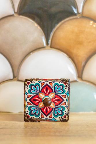 a small box sitting on top of a chair at Gorgona Blue Apartments in Karpathos Town