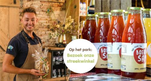 a man standing in front of a display of ketchup at Riverdome met privé sanitair - en weids uitzicht - NIEUW 2021 in Zuna