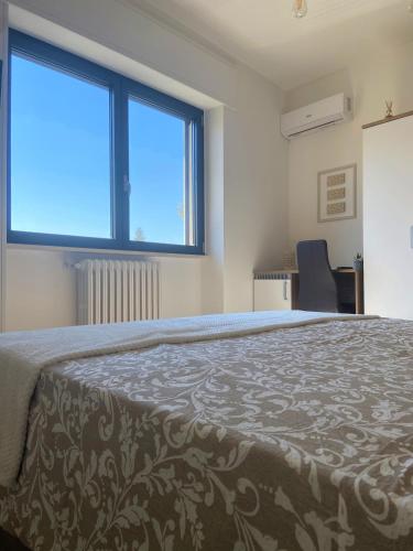 Ένα ή περισσότερα κρεβάτια σε δωμάτιο στο B&B Brezza Salentina