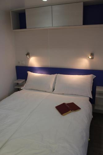 Katil atau katil-katil dalam bilik di Agriturismo Al-Bor