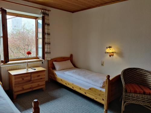 En eller flere senger på et rom på Pension Berg&Bleibe Wertach