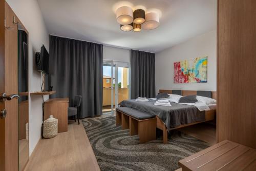 Posteľ alebo postele v izbe v ubytovaní Casa Mateo Rovinj