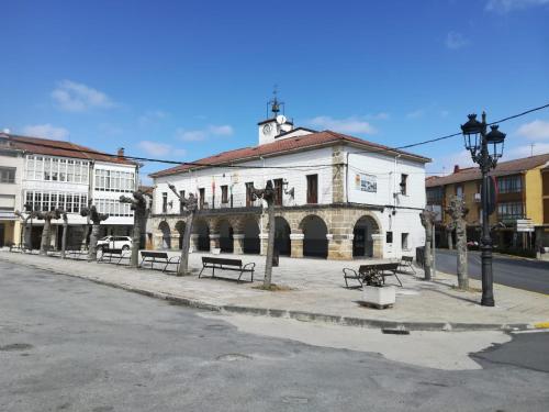 an old building on the side of a street at La Casa del Valle in Soncillo
