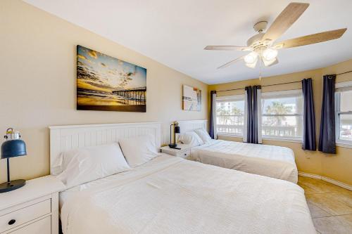 Voodi või voodid majutusasutuse Gulf Point Condominiums toas
