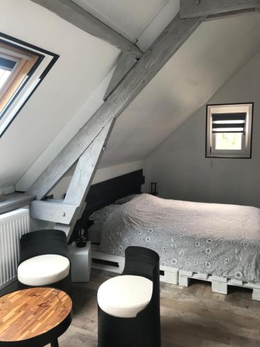 Postel nebo postele na pokoji v ubytování Chambre d'hôtes "COQUELICOT"