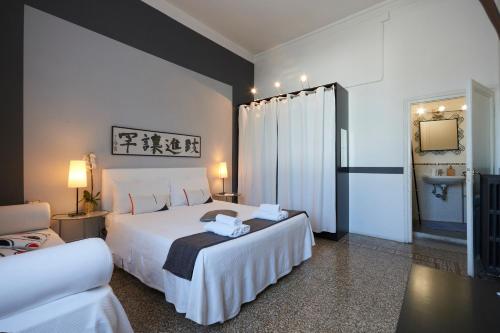 Cama o camas de una habitación en B&B In Centro
