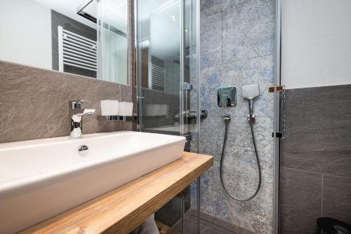 Salle de bains dans l'établissement Michis Aparthotel