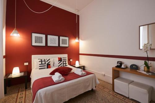 Cama o camas de una habitación en B&B In Centro