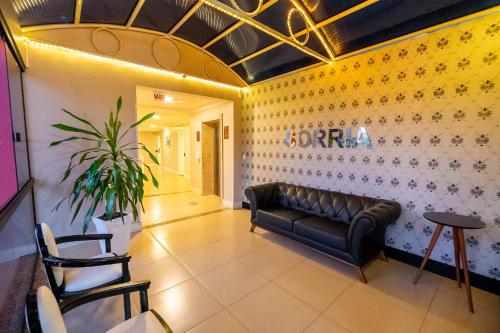 Χώρος καθιστικού στο Hotel Rouxinol