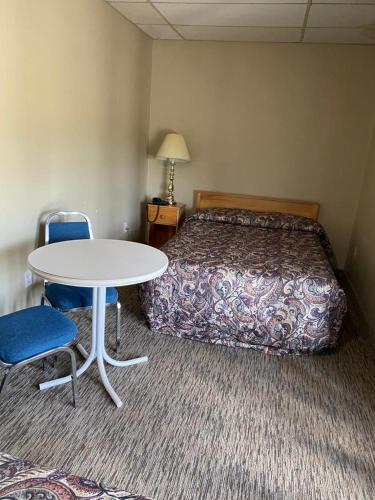 Ένα ή περισσότερα κρεβάτια σε δωμάτιο στο North Adventure Inn