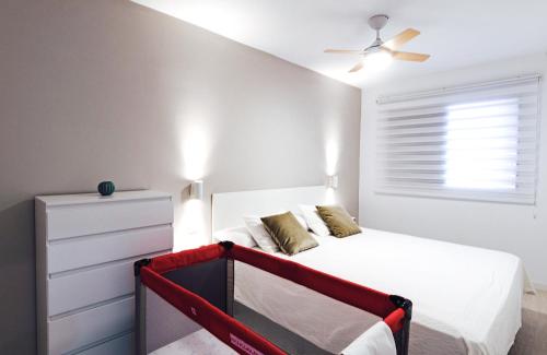 Uma cama ou camas num quarto em Apartment EL Médano Experimental Beach