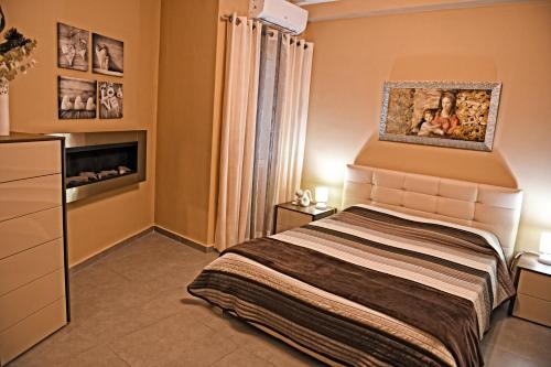Ein Bett oder Betten in einem Zimmer der Unterkunft Saghtrija Luxury Apartments