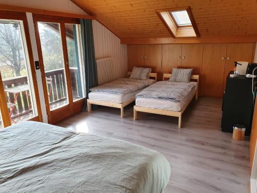 Postel nebo postele na pokoji v ubytování Maison Chalet