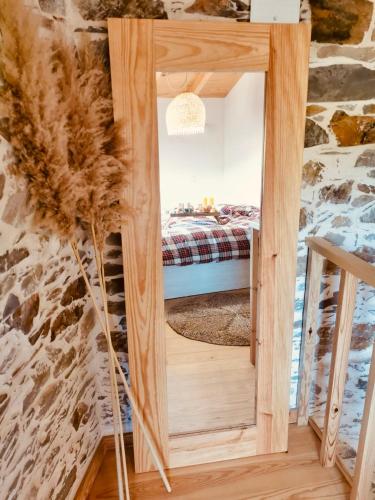 Ένα ή περισσότερα κρεβάτια σε δωμάτιο στο Casa do Ti Tóte